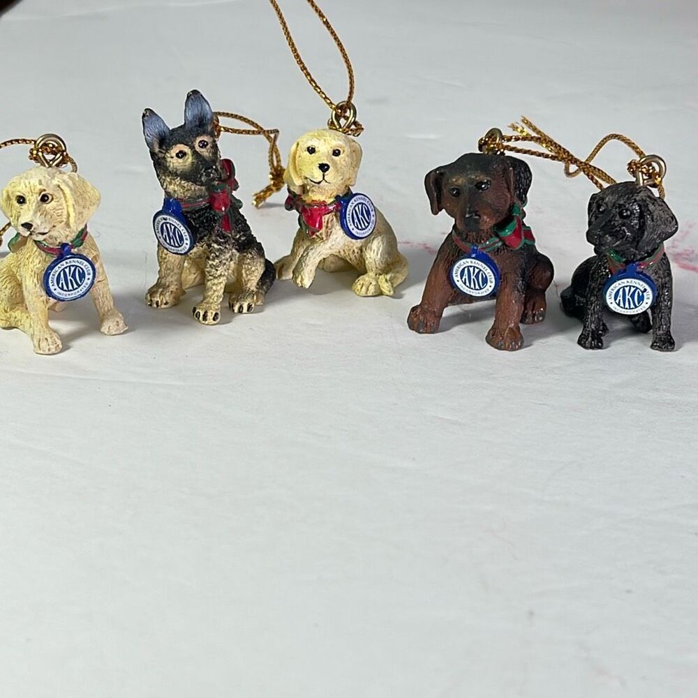 Lot of 5 American Kennel Club tiny dog ornaments.